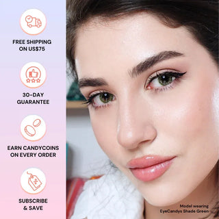 Close-up of a woman with green eyes and winged eyeliner, wearing EyeCandys Shade Green contacts. Icons on the left highlight: free shipping over $75, 30-day guarantee, CandyCoins rewards, and subscribe & save.