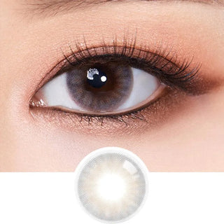 A close-up of a brown eye with long lashes wearing Olola Amuse Grey contact lens by Olola, designed for dark eyes. Below is an enlarged view of the lens’s grey color and pattern, suitable for myopia prescription.