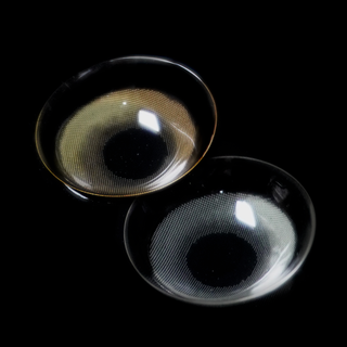 Macro photo of EyeCandys Amelie Biscuit Brown and Earl Grey prescription colored contact lenses showcasing the thin material and cosmetic lens design