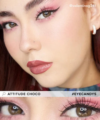 A close-up of a person with pink eye makeup, black winged liner, mauve lips, and light brown contacts. Hashtags and overlay: "ATTITUDE CHOCO," "EyeCandys Attitude Glitter Set," "EyeCandys," and "#EYECANDYS.