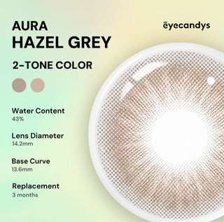 Promotional image for EyeCandys Aura Hazel Grey contacts by EyeCandys, showing a close-up on brown eyes. Features: 43% water content, 14.2mm diameter, 13.6mm base curve, UV blocking, and 3-month replacement schedule.