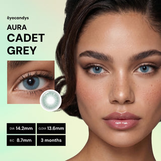 A close-up of a woman wearing EyeCandys Aura Cadet Grey contacts, with an inset of her eye and details: diameter 14.2mm, graphic diameter 13.6mm, base curve 8.7mm, lasts 3 months.