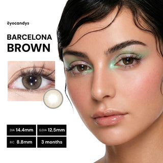 Close-up of a woman with light brown eyes and green eye makeup, wearing EyeCandys Pink Label Barcelona Brown contact lenses. An inset shows the comfortable colored contacts on her eye, with lens specs displayed beside her face.
