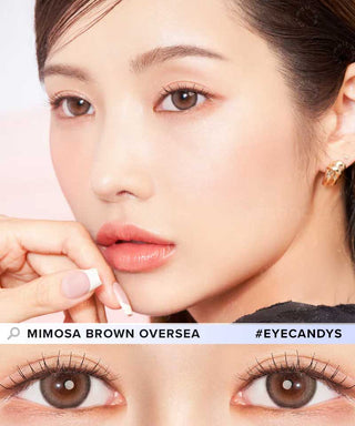 Close-up of a woman with natural makeup wearing Clalen IRIS Mimosa Brown (10pk) contacts by Clalen, designed for myopia. A zoomed view highlights her brown eyes. Text reads "MIMOSA BROWN OVERSEA" and "#EYECANDYS.