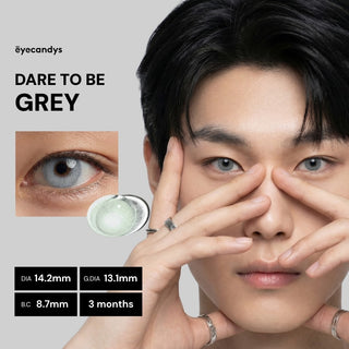 Male Asian model wearing EyeCandys Dare to Be Grey colored contact lens, striking grey eye look, best contact lens for style, affordable contact lens price