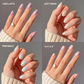 Four images display a hand with EyeCandys Milk Bar Press-On Nail Set in pastel shades—Taro Latte, Soft Serve, Peritinkle, and Silk Slip. The long-lasting nails are complemented by a gold ring with a white stone for an elegant touch.