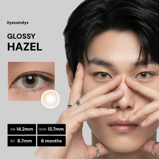 Male model wearing EyeCandys Glossy Hazel prescription colored contact lens, vibrant and natural hazel eyes, best contact lens, affordable contact lens price