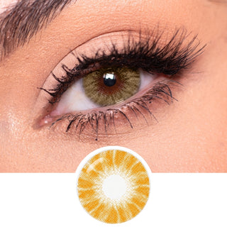 Close-up of an eye with long lashes wearing EyeCandys Shade Brown contact lenses. Below, a circular image showcases the detailed pattern and vibrant color of these EyeCandys brown colored contacts.