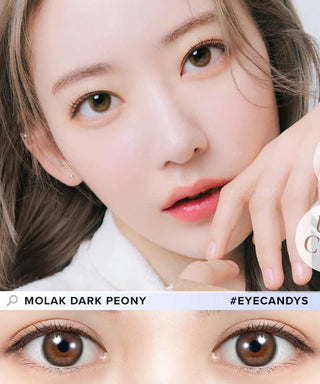 A close-up shows a person with light makeup and brown hair wearing Molak Dark Peony (10pk) color contacts. Below, brown eyes also wear the same daily lenses. Text: "MOLAK DARK PEONY" and "#EYECANDYS". Brand: Molak.