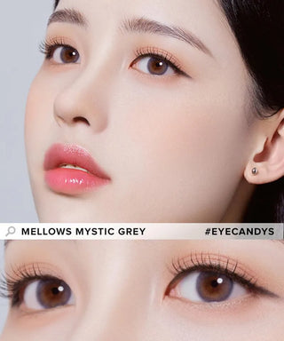 A close-up shows a woman’s smooth skin, glossy pink lips, and brown eyes with natural makeup. A lower image zooms in on her eyes featuring Olola Mellows Mystic Grey lenses by Olola, highlighting her long lashes. Text: “Olola Mellows Mystic Grey #EYECANDYS.”.