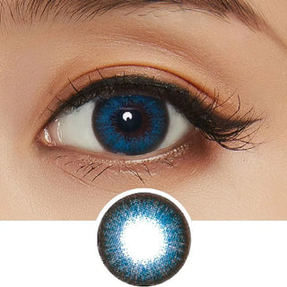 A close-up of a person's eye wearing NEO Vision Extra Dali Blue contacts, with an inset highlighting the detailed blue circle lens design from NEO Vision.