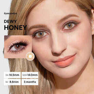 Model wearing Pink Label Dewy Honey colored contact lenses with warm honey brown eye enhancement