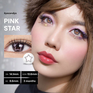 A close-up of a person wearing EyeCandys Pink Star pastel contacts with star designs and pink makeup. Inset shows lens details: DIA 14.1mm, G.DIA 13.6mm, B.C. 8.6mm, usable for 3 months by EyeCandys.