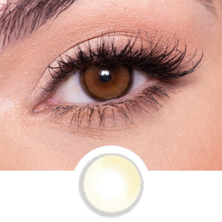 Close-up of a brown eye with long lashes and natural makeup. Below, a circular image highlights EyeCandys Peach Fuzz Bundle (5 Pairs) non-prescription contacts in a light brown shade.