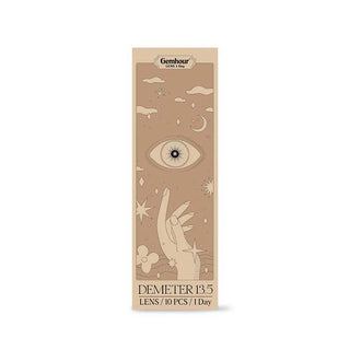 Gemhour Demeter 1-Day 13.5 Amber Brown (10pk) color contacts by Gemhour come in a beige box with illustrated hand, eye, stars, clouds, and moons. The label states "DEMETR 13.5 LENS/10 PCS/1 Day" for daily disposable use.