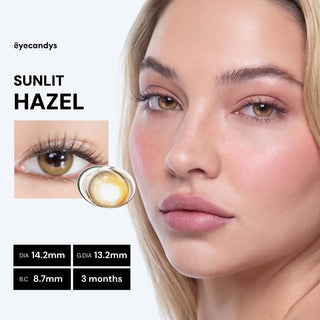 Model wearing EyeCandys Sunlit Hazel prescription colored contact lens, close-up of eye, natural sunlight highlighting hazel tones, showing comfort and vibrant color