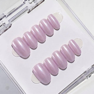 Eyecandys Taro Latte press-on nails featuring a soft taro purple chrome finish, pearlescent glazed shine, and a short oval shape.