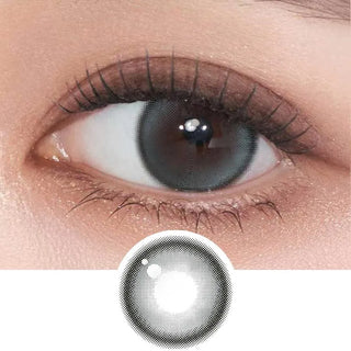 A close-up of a human eye wearing Gemhour Demeter 1-Day 13.0 Ocean Blue lenses, which make the iris appear larger and blue. Below is an enlarged image of the daily disposable lens design from Gemhour's 10-pack product.