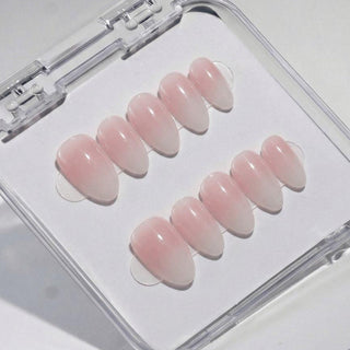 EyeCandys Glazed Donut press on nails featuring soft pink to milky white glazed ombre finish in a glossy clean girl nail aesthetic.