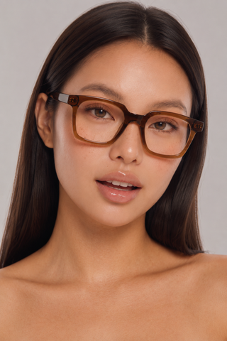 EyeCandys Hotshot Square Brown clear lens glasses model shot featuring oversized brown square frames with non-prescription clear lenses, trendy women's fashion eyewear, blue light style glasses for everyday wear, office outfits, minimalist fashion, and modern chic looks.