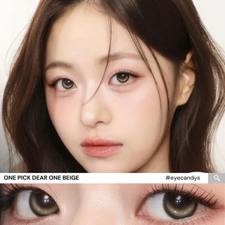 Close-up of model’s eyes wearing i-Girl One Pick Dear One Beige contact lenses from EyeCandys, showing soft beige iris color, realistic highlights, weighted non-rotating design, and subtle eye-widening effect