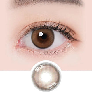 Macro shot of an eye wearing the i-Sha Ariel Brown prescription colour contact lens, showing the multi-colored detail and natural effect on dark brown eyes, with clean eye makeup. At the bottom is the pattern of the colored lens design, showing the dotted detail and pigmentation.