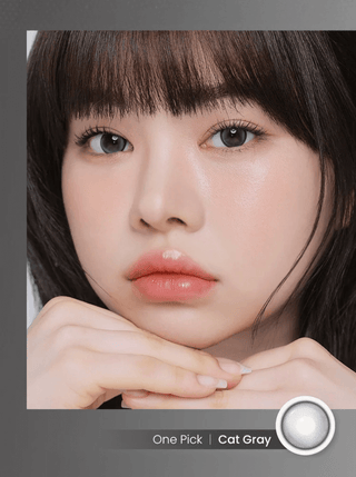 Girl showcasing Eyecandys Onepick Cat Gray prescription colored contact lenses – vibrant and comfortable color contact lenses for a striking eye look