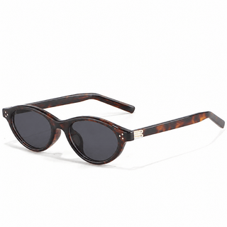 EyeCandys Loretta Tortoiseshell oval sunglasses product shot on a white background featuring a lightweight full-frame design. Trendy unisex fashion sunglasses with a vintage-inspired oval silhouette, flattering for diamond and heart face shapes. Stylish everyday UV protection eyewear in a classic tortoiseshell frame.