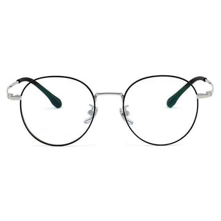 The EyeCandys Luna Round features vintage-style titanium eyeglasses with thin silver rims, clear lenses, black temple tips, and adjustable nose pads, all displayed on a white background.