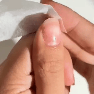 Preparation process before applying EyeCandys press-on nails showing nail cleaning, cuticle prep, buffing, adhesive application, and step-by-step manicure setup for long-lasting wear