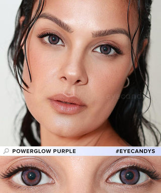 A woman with wet hair and natural makeup wears EyeCandys Powerglow Bluish Purple contact lenses. A close-up shows the lens’s intricate pattern and vivid color. Text reads "POWERGLOW BLUISH PURPLE" and "#EYECANDYS".