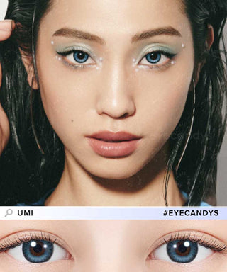 A woman wears N's Collection Umi Blue (10pk) colored contacts, green eyeshadow, white eyeliner, small white dots above her eyebrows, and glossy pink lips. Below is a close-up of her eyes with the daily disposable blue lenses from N's Collection.