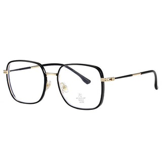 The EyeCandys Therese Oversized Square glasses feature large square TR and metal frames, thin gold arms, and clear lenses, showcased on a white background for a modern, lightweight eyewear look.