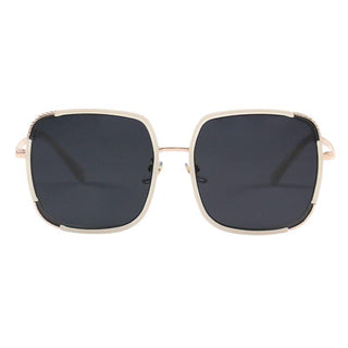 Amalfi  Quartz sunglasses from EyeCandys, showcasing a chic summer look with purple tinted lenses and a sleek frame