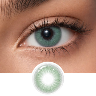 Close-up of an eye wearing EyeCandys Aura Green Grey contact lenses by EyeCandys, with the lens shown separately below. These light green-grey lenses feature a detailed pattern for a jewel-toned effect.