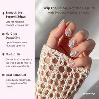 A hand with pastel floral Birthday Cake Press-On Nails by EyeCandys rests on a crocheted sleeve. Text highlights salon-quality gel, smooth edges, no-chip durability, and a no-lift fit. Sunlight creates a soft shadow on the beige background.