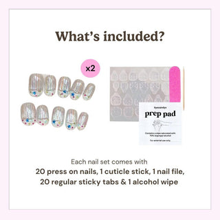 Image shows two Birthday Cake Press-On Nails designs by EyeCandys, plus a cuticle stick, pink nail file, sticky tabs sheet, and alcohol prep pad—all included in the set.