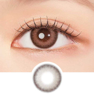 A close-up of an eye wearing Clalen IRIS Pink Tulip (10pk) lenses by Clalen shows a natural, slightly enlarging effect. Below is an image of the lens displaying its pink color and pattern, suitable for myopia prescription.