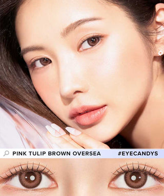 Close-up of a woman with flawless skin, light pink makeup, and manicured nails touches her chin. Her brown eyes shine with Clalen IRIS Pink Tulip (10pk) myopia contacts. Text: "Pink Tulip Brown Oversea #EYECANDYS". Brand: Clalen.