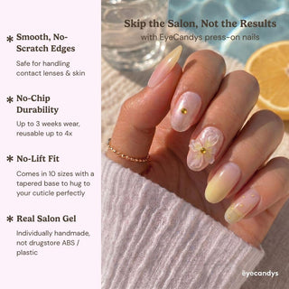 EyeCandys Daisy Does It Press-On Nails are shown on a hand with a 3D flower accent, posed against a cozy sweater and lemon slice. Highlights: smooth edges, no-chip durability, secure fit, and real salon gel quality.