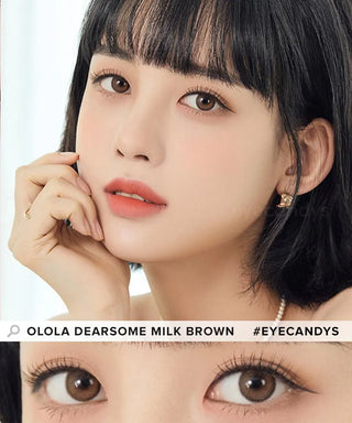 A woman with short black hair and natural makeup gazes at the camera, her hand on her cheek. A close-up shows her wearing Olola Dearsome Milk Brown contact lenses, available in both prescription and non-prescription. #EYECANDYS.