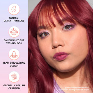 A woman with red hair and purple eye makeup wears EyeCandys Powerglow Bluish Purple contact lenses. Icons to the left highlight features: gentle ultra-thin edge, sandwiched dye tech, tear-circulating design, global health certification.