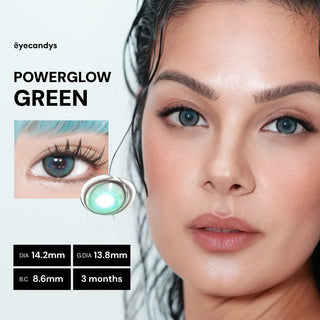 Close-up of a woman wearing EyeCandys Powerglow Turquoise Green lenses. Text: "EyeCandys POWERGLOW TURQUOISE GREEN." Inset displays vibrant turquoise green contacts: DIA 14.2mm, G.DIA 13.8mm, B.C 8.6mm, moisture retention, 3 months.