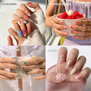 A labeled collage features EyeCandys’ In Full Bloom Press-On Nail Set with four styles: colorful floral, red fruit-themed, pastel cottagecore, and elegant pink and nude nails adorned with flowers and pearls.