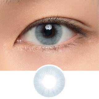 Close-up of model’s eye wearing EyeCandys Glossy Blue colored contact lens, vibrant natural blue look, best contact lens, affordable contact lens price