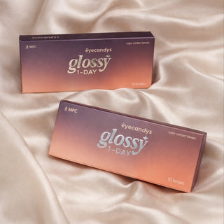 Eyecandys Glossy Ivory 1-Day (10pk) contact lens packaging, showing box design, branding, and product details.