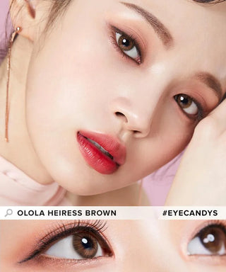 A close-up of a woman wearing warm-toned eye makeup and reddish lipstick. She has Olola Heiress Brown color contact lenses for dark eyes with myopia prescription from Olola. Text reads "Olola Heiress Brown #EYECANDYS.