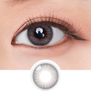 Macro shot of an eye wearing the Olola Dazzling 1-Day Ice Grey (10pk) (KR) colour contact lens, showing the multi-colored detail and natural effect on dark brown eyes, with clean eye makeup
