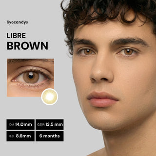 Male model wearing EyeCandys Libre Brown prescription colored contact lens, natural and warm brown eyes, best contact lens, affordable contact lens price