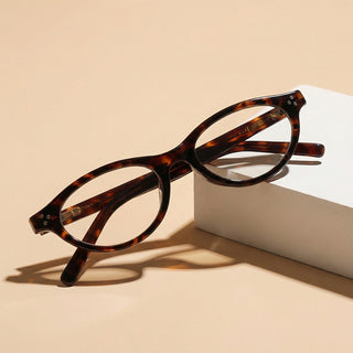 Loretta Oval prescription reading glasses by Eyecandys, full frame design, blue light blocking lenses, perfect for Diamond and Heart face shapes.